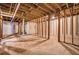 Unfinished basement with visible wooden beams and concrete floor at 446 Waterford Nw Rd, Atlanta, GA 30318