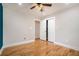 Open bedroom with hardwood floors and bi-fold closet doors at 446 Waterford Nw Rd, Atlanta, GA 30318
