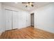 Bright, airy bedroom features hardwood floors and double door closet at 446 Waterford Nw Rd, Atlanta, GA 30318