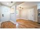 Bright entryway featuring gleaming hardwood floors, fresh paint, and easy access to the rest of the home at 446 Waterford Nw Rd, Atlanta, GA 30318