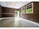 Spacious room with two windows and a door leading to the outside at 446 Waterford Nw Rd, Atlanta, GA 30318