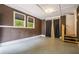 View of room with two windows and stairway to the outside at 446 Waterford Nw Rd, Atlanta, GA 30318