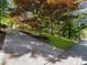 View of the driveway and lush front yard at 579 Fielding Ln, Atlanta, GA 30311