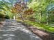 Brick home with lush front yard and a long driveway at 579 Fielding Ln, Atlanta, GA 30311