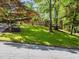 Inviting brick home with manicured lawn and mature trees at 579 Fielding Ln, Atlanta, GA 30311