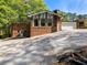Exterior view of a brick home with an attached garage and driveway at 579 Fielding Ln, Atlanta, GA 30311