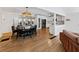 Open floor plan with wood floors, an adjacent kitchen, a living room, and a dining room that is great for entertaining at 579 Fielding Ln, Atlanta, GA 30311