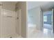Clean bathroom with a walk-in shower and a soaking tub at 1316 Durham Ter, Mcdonough, GA 30252