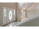 Inviting foyer with tiled floor and white front door at 1316 Durham Ter, Mcdonough, GA 30252