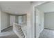 Carpeted hallway with staircase and multiple rooms at 1316 Durham Ter, Mcdonough, GA 30252