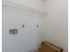 Laundry room with unfinished wall and electrical fixtures at 1316 Durham Ter, Mcdonough, GA 30252