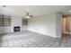 Spacious living room featuring a fireplace, built-in shelving, and tile floors at 1316 Durham Ter, Mcdonough, GA 30252