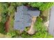 Aerial view of the home showcasing the roof, landscaping, and driveway at 1431 Waterford Green Dr, Marietta, GA 30068