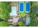 An aerial view showcases the community pool, tennis courts, basketball court and clubhouse at 1431 Waterford Green Dr, Marietta, GA 30068