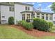The home has a manicured backyard, mature plantings, and a deck at 1431 Waterford Green Dr, Marietta, GA 30068