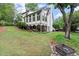 Expansive backyard with firepit, multi-level deck and patio, and lush landscaping at 1431 Waterford Green Dr, Marietta, GA 30068