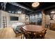 Open concept basement offers entertainment space including a bar, dining area, and lounge at 1431 Waterford Green Dr, Marietta, GA 30068