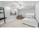 Bedroom featuring neutral walls, carpet, modern desk, ladder shelving and overhead fan at 1431 Waterford Green Dr, Marietta, GA 30068