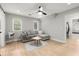 Cozy bonus room with hardwood floors, a comfortable couch, and natural light at 1431 Waterford Green Dr, Marietta, GA 30068