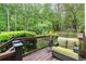 The outdoor deck features wooden decking, metal railings and outdoor furniture at 1431 Waterford Green Dr, Marietta, GA 30068