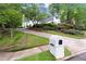 Well-manicured lawn and landscaping enhance this home's curb appeal at 1431 Waterford Green Dr, Marietta, GA 30068