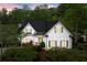 Beautiful exterior view of the home with lush landscaping in the front yard at 1431 Waterford Green Dr, Marietta, GA 30068