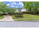 Charming home with lush front lawn and mature landscaping at 1431 Waterford Green Dr, Marietta, GA 30068