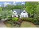 Charming two-story home with mature trees and lush landscaping at 1431 Waterford Green Dr, Marietta, GA 30068