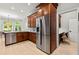 Modern kitchen featuring stainless steel appliances and ample custom wood cabinet storage at 1431 Waterford Green Dr, Marietta, GA 30068