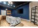 Finished basement living room featuring modern decor, hardwood floors, and a large television at 1431 Waterford Green Dr, Marietta, GA 30068