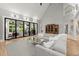 Bright living room featuring floor-to-ceiling glass doors, vaulted ceilings, and hardwood floors at 1431 Waterford Green Dr, Marietta, GA 30068