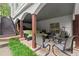 The covered outdoor patio includes ceiling support columns and comfortable seating at 1431 Waterford Green Dr, Marietta, GA 30068