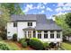 Back of home featuring multiple windows, a deck, and a well-manicured backyard at 1431 Waterford Green Dr, Marietta, GA 30068