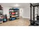Finished basement featuring gym equipment and ample storage, creating a versatile space at 1598 Olympian Sw Cir, Atlanta, GA 30310
