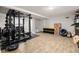Finished basement featuring gym equipment and ample storage, creating a versatile space at 1598 Olympian Sw Cir, Atlanta, GA 30310