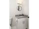 Elegant bathroom featuring granite vanity, modern lighting, and fixtures at 1598 Olympian Sw Cir, Atlanta, GA 30310