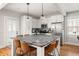 Bright kitchen with granite countertops, a breakfast bar, and stainless steel appliances at 1598 Olympian Sw Cir, Atlanta, GA 30310