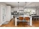 Bright kitchen with granite countertops, a breakfast bar, and stainless steel appliances at 1598 Olympian Sw Cir, Atlanta, GA 30310