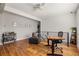 Stylish living room with hardwood floors, modern furnishings, and a chic bar cart at 1598 Olympian Sw Cir, Atlanta, GA 30310