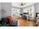 Bright and spacious office with hardwood floors, ample natural light, and a comfortable seating area at 1598 Olympian Sw Cir, Atlanta, GA 30310
