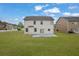 Spacious backyard featuring a patio and lush green lawn at 209 Woodmill Sw Way, Atlanta, GA 30331