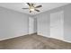 Bedroom featuring neutral paint, plush carpet, and a ceiling fan for added comfort at 209 Woodmill Sw Way, Atlanta, GA 30331