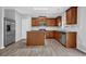Well-lit kitchen features stainless steel appliances, granite countertops, and an island with lots of cabinet space at 209 Woodmill Sw Way, Atlanta, GA 30331