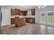 Well-lit kitchen features stainless steel appliances, an island, granite countertops and light gray walls at 209 Woodmill Sw Way, Atlanta, GA 30331