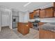 Well-lit kitchen features stainless steel appliances, an island, granite countertops and light gray walls at 209 Woodmill Sw Way, Atlanta, GA 30331