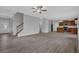 Open-concept living area with hardwood floors and staircase at 209 Woodmill Sw Way, Atlanta, GA 30331