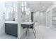 Bright bathroom featuring modern fixtures, marble accents, a vanity, and glass shower at 3475 Oak Valley Ne Rd # 2940, Atlanta, GA 30326