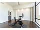 Bright exercise room featuring a stationary bike, large windows, and natural light to enhance workouts at 3475 Oak Valley Ne Rd # 2940, Atlanta, GA 30326