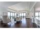 Expansive living room with floor-to-ceiling windows offering abundant natural light and panoramic city views at 3475 Oak Valley Ne Rd # 2940, Atlanta, GA 30326