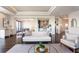 Bright living room featuring a stylish sofa, hardwood floors, and open layout with a kitchen view at 3475 Oak Valley Ne Rd # 2940, Atlanta, GA 30326